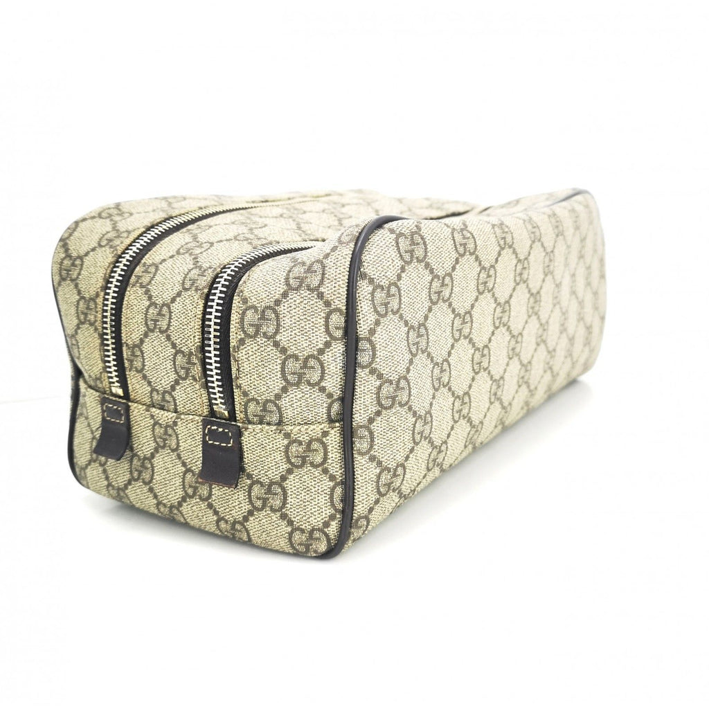 Bolso Neceser de viaje GUCCI 211125 / 525040 en lona GG Supreme y piel de segunda mano